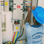 checking the electrical board to make clear connections