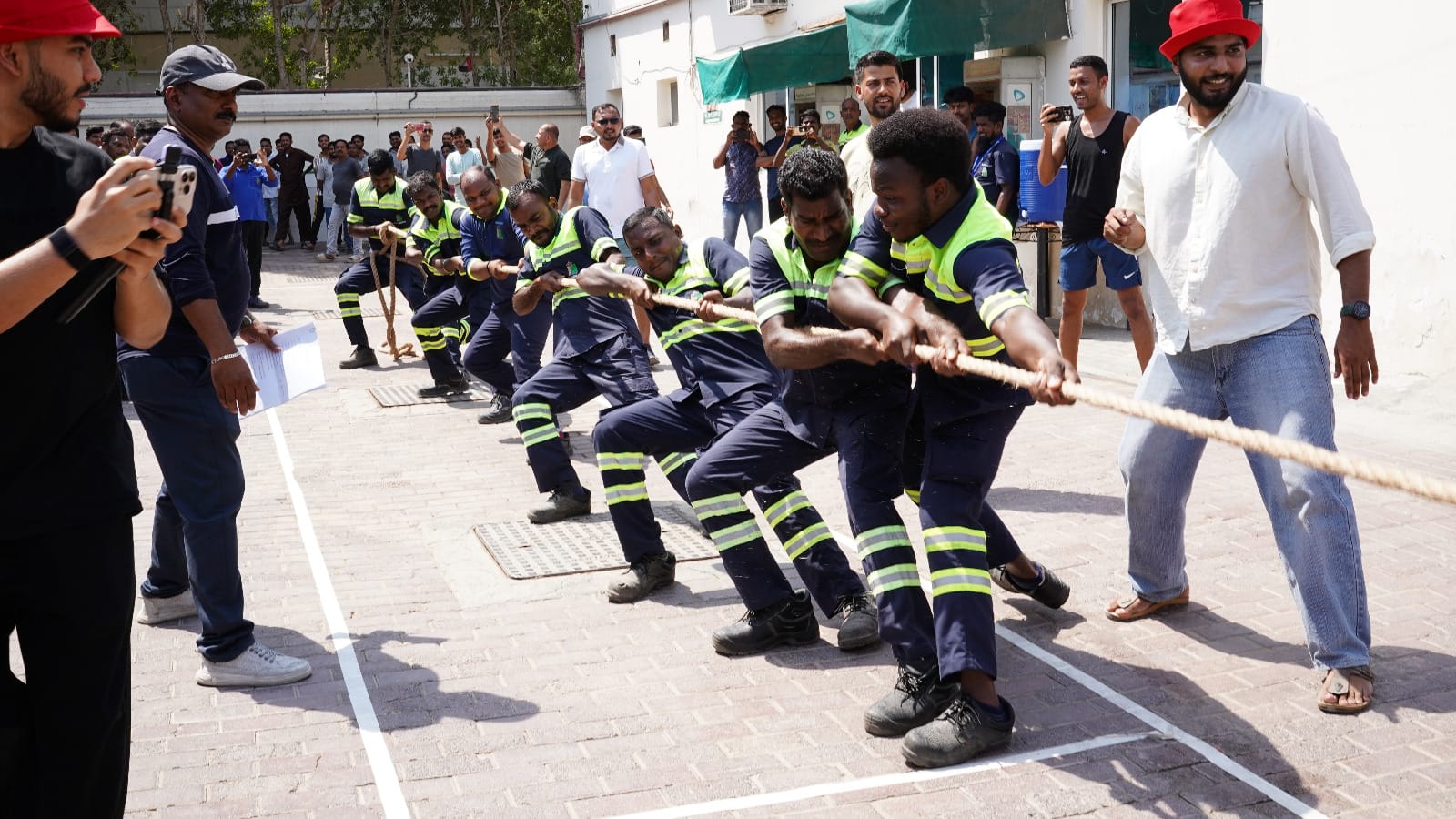 Employees gathered for the Blue Diamond Group Tug of War Competition and team-building activity.